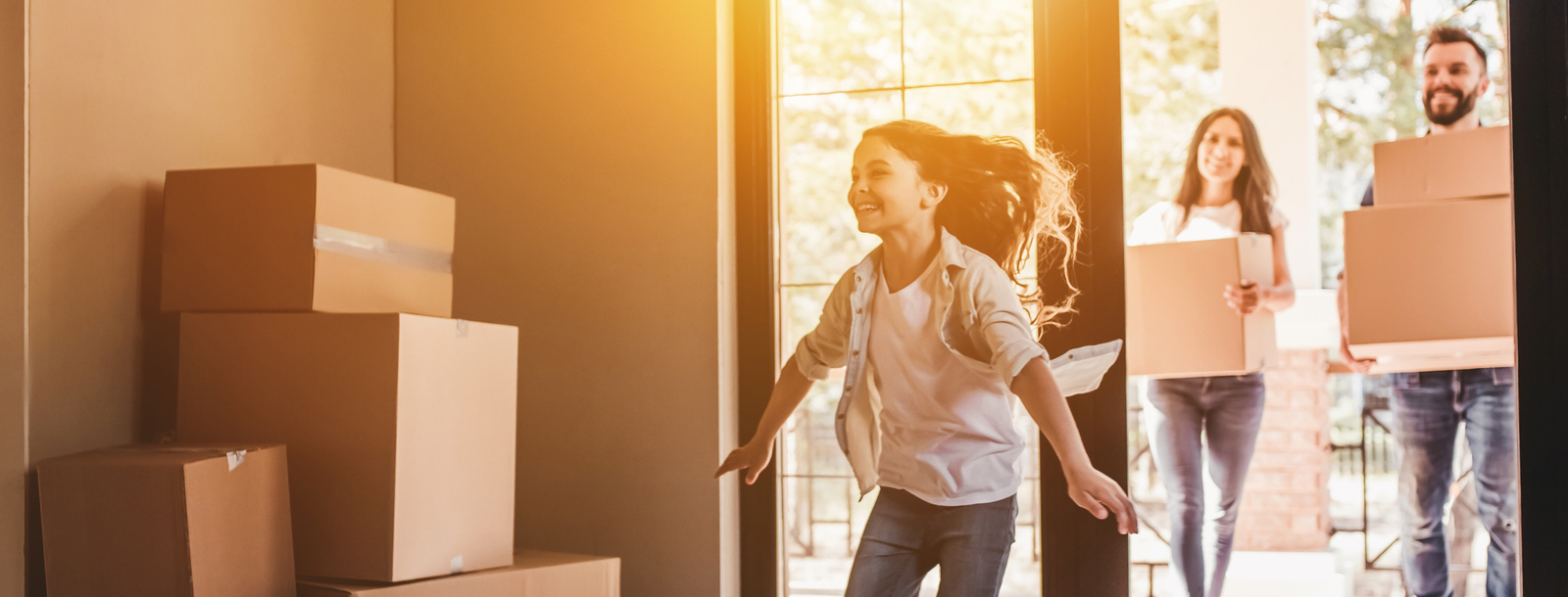 Family moving into their new house.