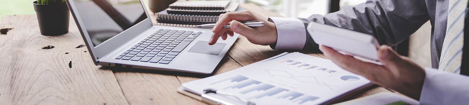 Person checking lending rates on their laptop.